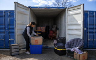 Customer preparing dry belongings before placing them into a SteelSafe storage unit.